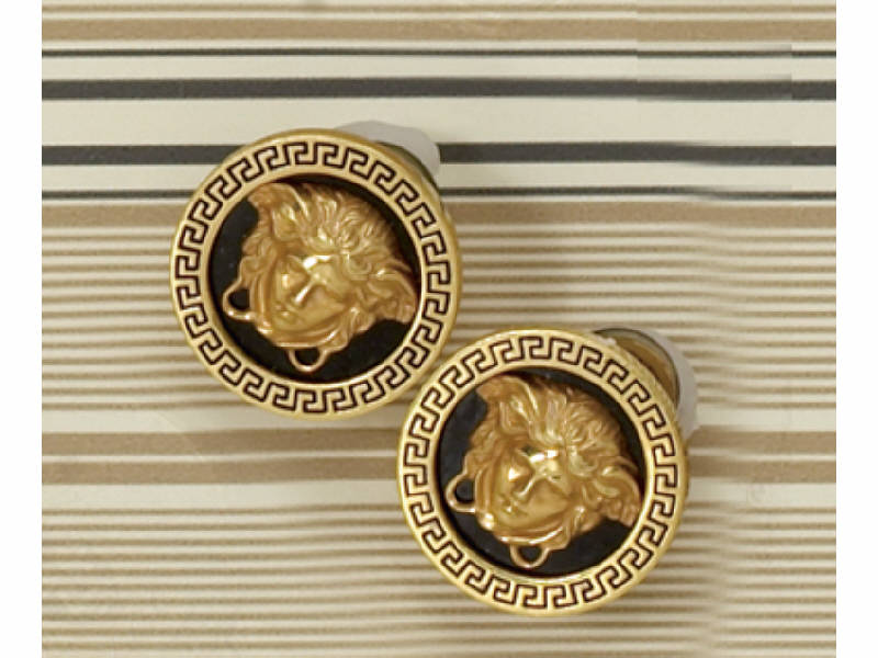 Appraisal: VERSACE EARRINGS Gianni Versace k yellow gold clip with Medusa