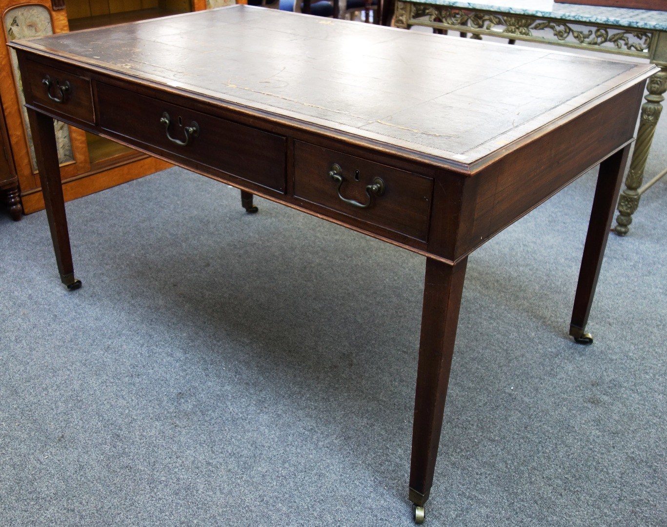 Appraisal: A George III mahogany centre writing table with an arrangement