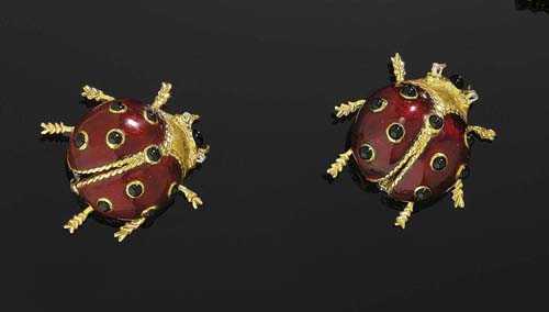 Appraisal: PAIR OF ENAMEL AND DIAMOND BROOCHES Yellow gold Two decorative