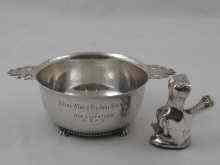 Appraisal: A silver two handled porringer on four pad feet cm