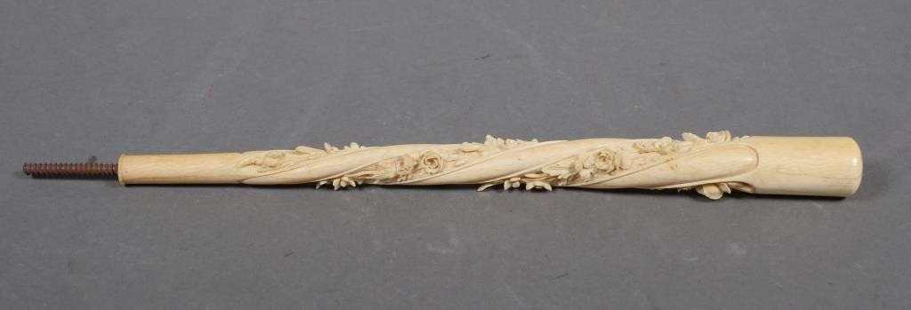 Appraisal: ANTIQUE CARVED IVORY PARASOL HANDLEOld th century ornate relief carved