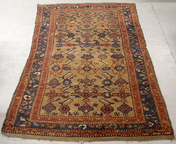 Appraisal: - Tribal oriental center hall carpet with geometric patterns and