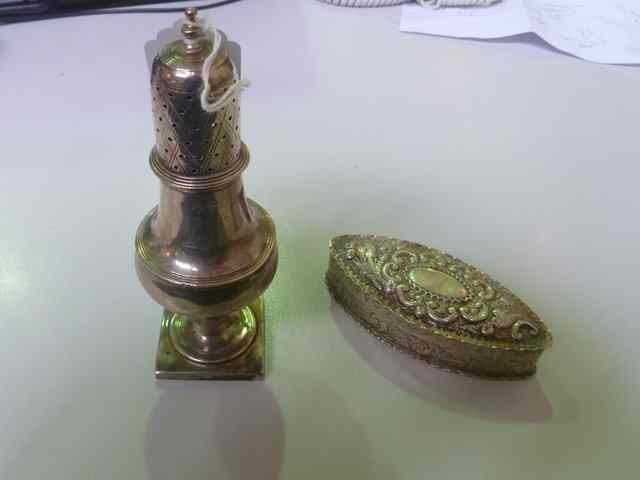 Appraisal: A GEORGIAN SILVER PEPPER POT of baluster form on square