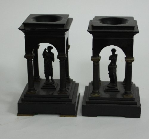 Appraisal: A pair of polished slate and gilt metal mounted models