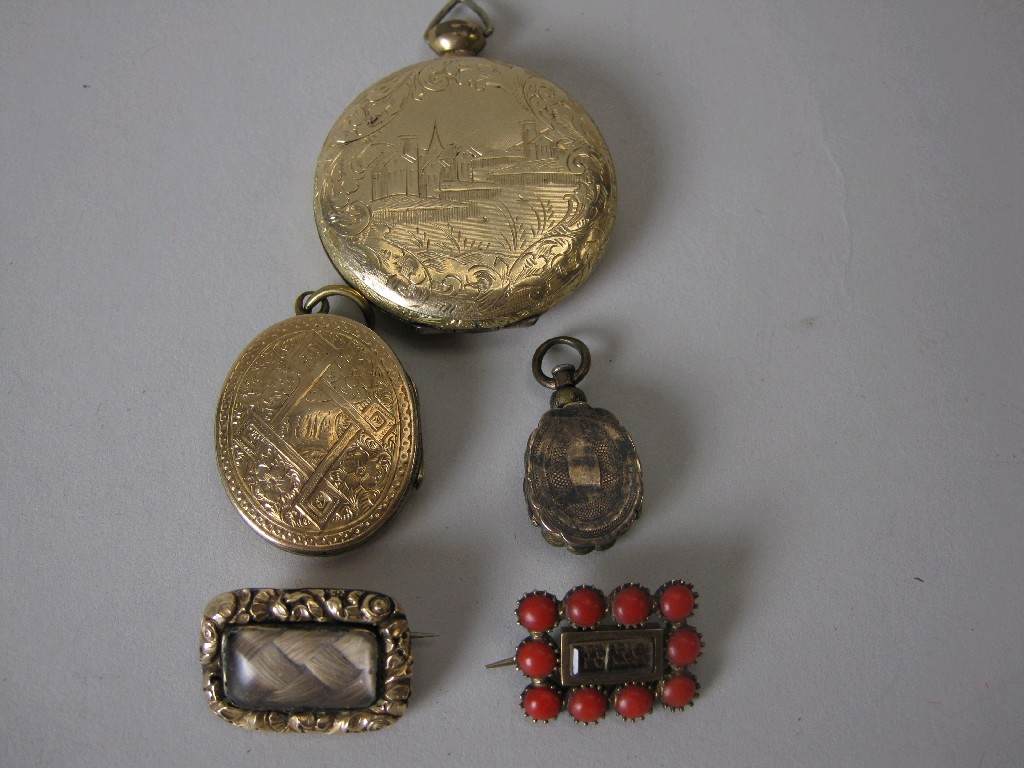 Appraisal: Two Victorian Gold Lockets two Georgian Memorial Hair Brooches one