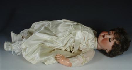 Appraisal: An early th century German bisque doll with loose composite