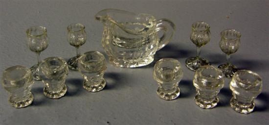 Appraisal: Set of four Venetian style miniature wine glasses and set