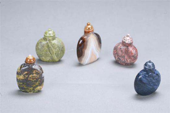 Appraisal: FIVE SNUFF BOTTLES China th century stone Flattened vase forms