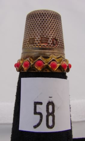 Appraisal: Germany sterling thimble with small red stones on band