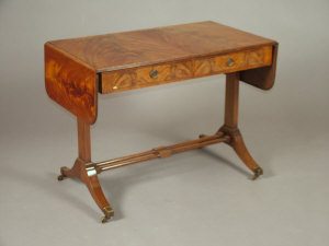 Appraisal: A George III style mahogany sofa table th century with