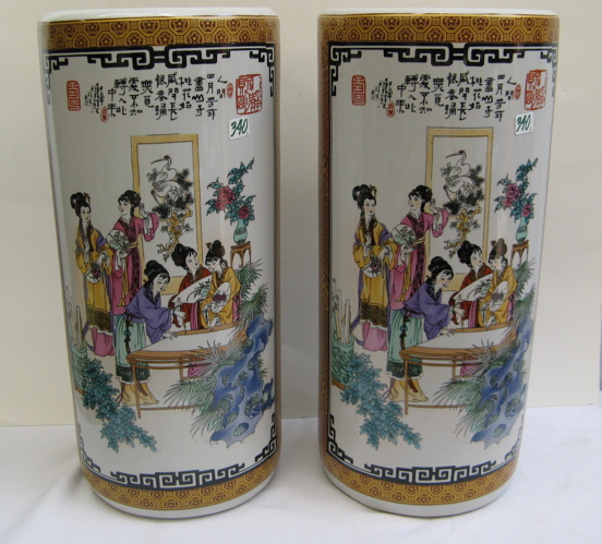 Appraisal: A PAIR OF CHINESE PORCELAIN UMBRELLA STANDS of ladies in