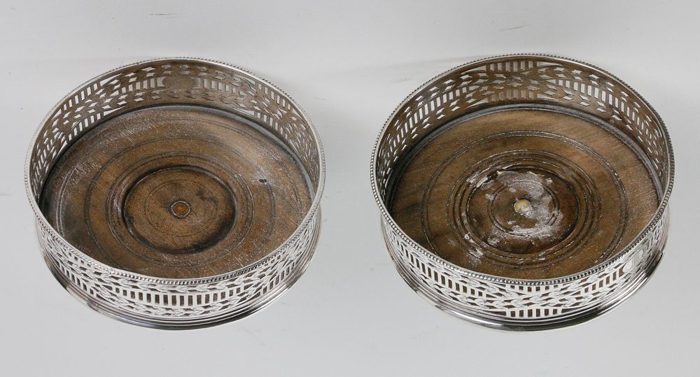 Appraisal: Pair of Sheffield Silver Plated Wine Coasters th Century Pair