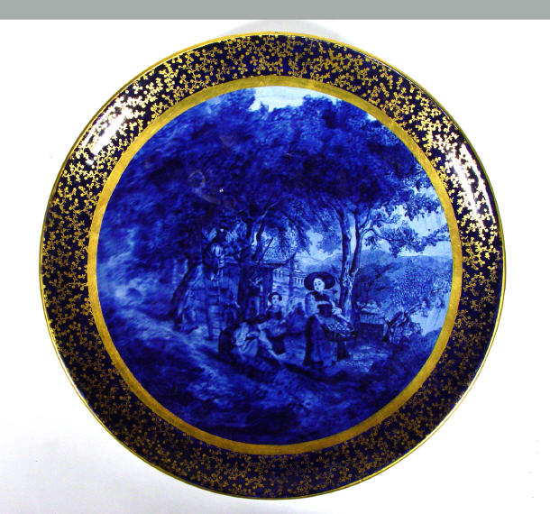 Appraisal: Continental pottery wall hanging plate transfer printed with blue harvesting