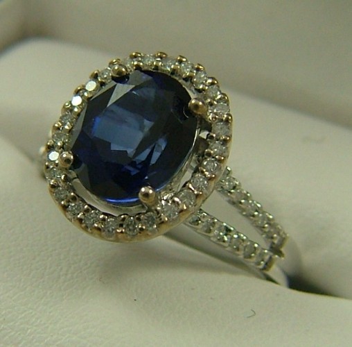 Appraisal: SAPPHIRE DIAMOND AND FOURTEEN KARAT GOLD RING The white gold