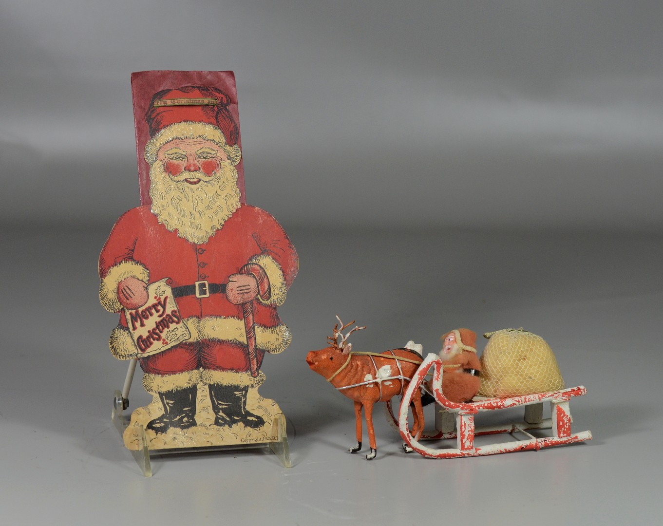 Appraisal: Japanese Santa and sleigh long with a cardboard and paper