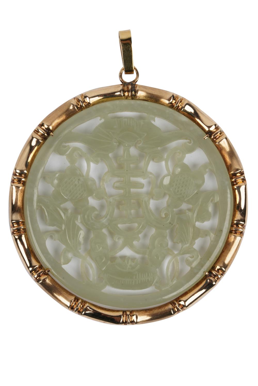 Appraisal: KARAT YELLOW GOLD CARVED GEMSTONE PENDANTcontaining one circular carved and