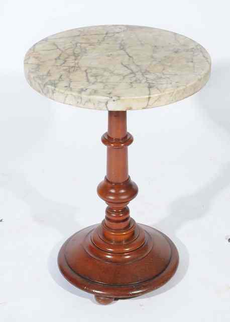 Appraisal: A WHITE MARBLE TOPPED MAHOGANY CIRCULAR OCCASIONAL TABLE with circular