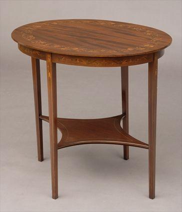 Appraisal: EDWARDIAN MARQUETRY-INLAID MAHOGANY OVAL-TOP TABLE With foliate scroll bands raised