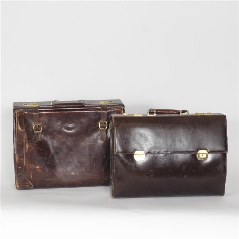 Appraisal: Two vintage leather travel brief cases Traveled the globe property