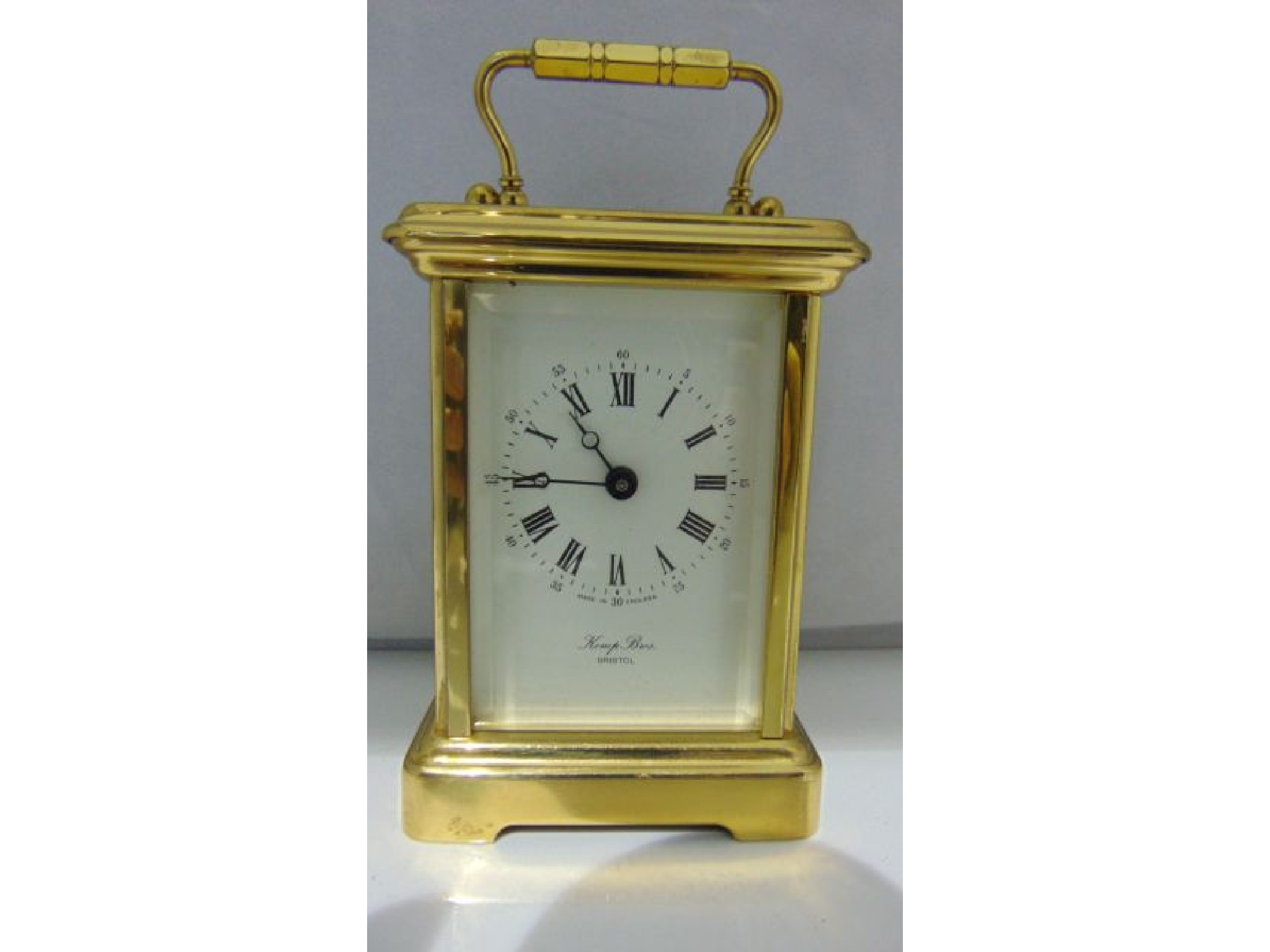 Appraisal: A small English brass carriage clock with eight day timepiece