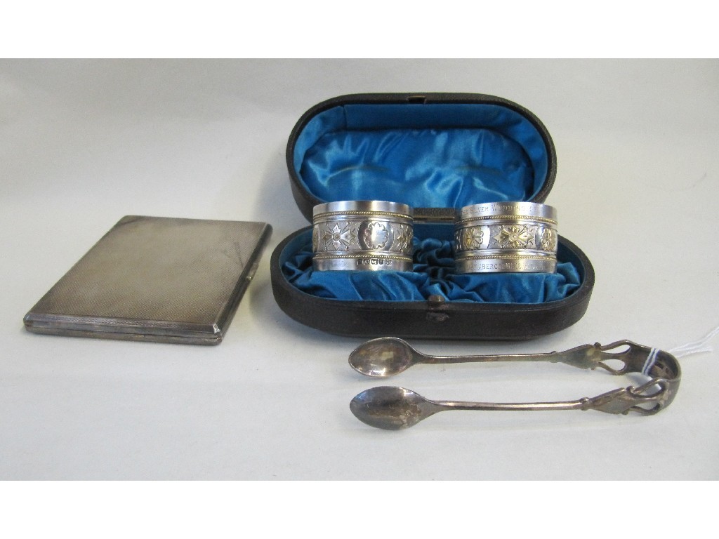 Appraisal: Lot comprising cased pair of silver napkin rings silver cigarette