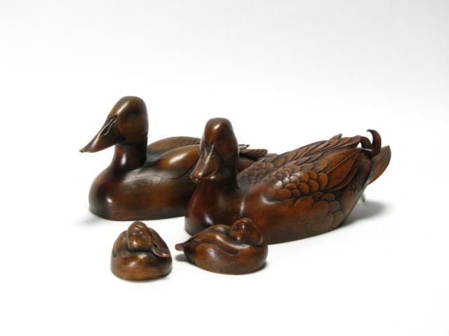 Appraisal: Jules Tony Bouillett IN b group of four carved duck