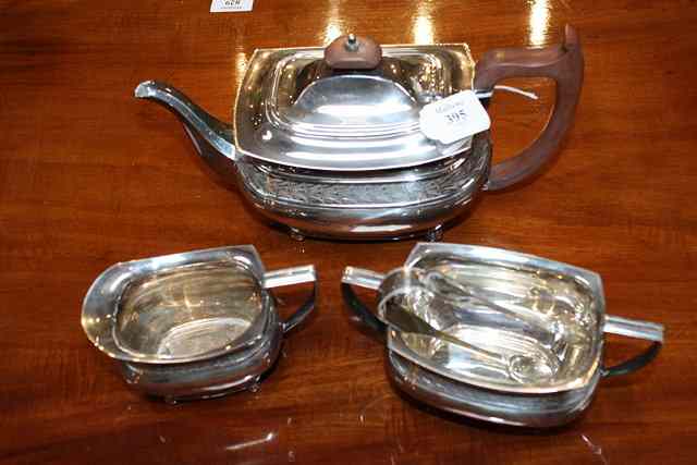 Appraisal: A SILVER THREE PIECE TEA SET oval baluster shaped teapot