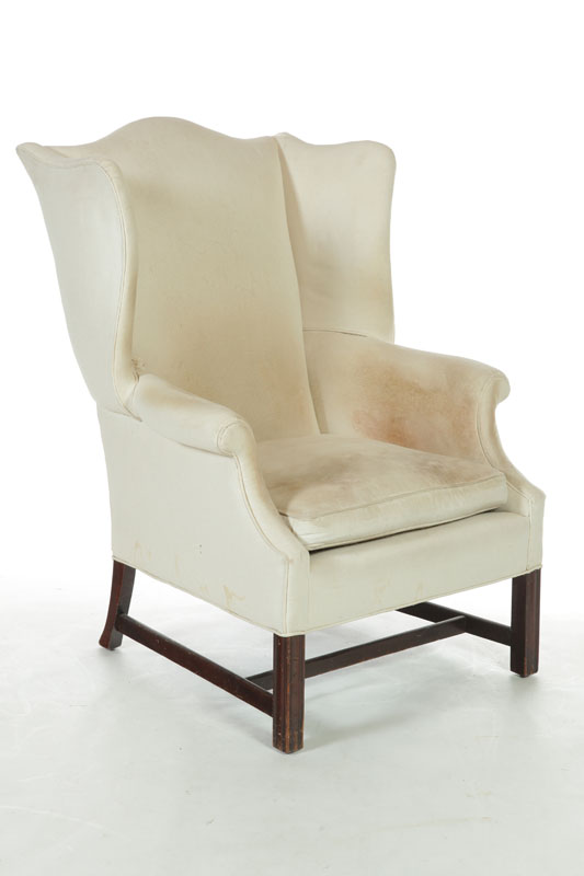 Appraisal: CHIPPENDALE-STYLE EASY OR WING CHAIR Twentieth century mahogany White upholstery