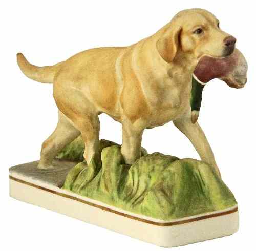 Appraisal: A Royal Worcester model of an Yellow Labrador modelled by