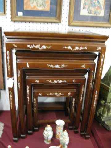 Appraisal: Oriental Teak Nest of Tables inlaid mother-of-pearl decoration tallest is