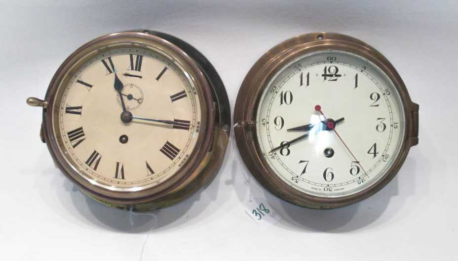 Appraisal: TWO BRASS CASE SHIPS CLOCKS the first by Smiths with