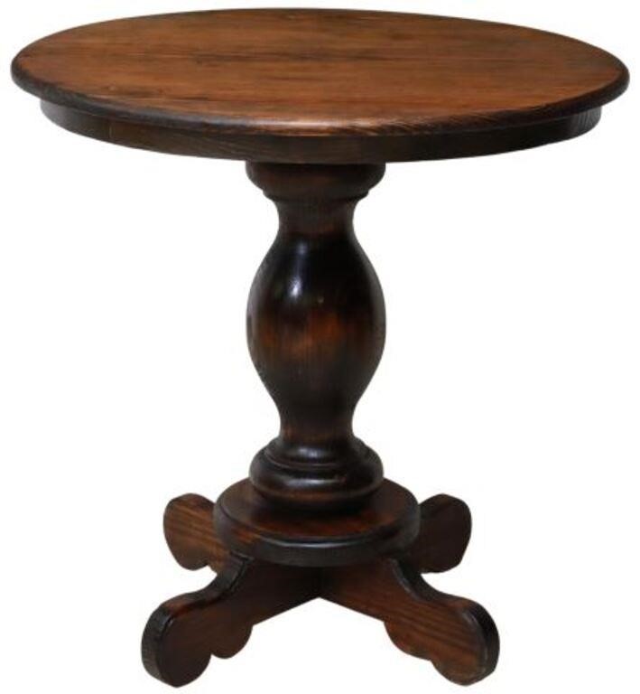 Appraisal: Pine pedestal center table th c having round top over