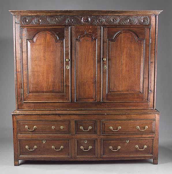 Appraisal: An Antique English Carved Oak Dresser molded cornice scrolled foliate