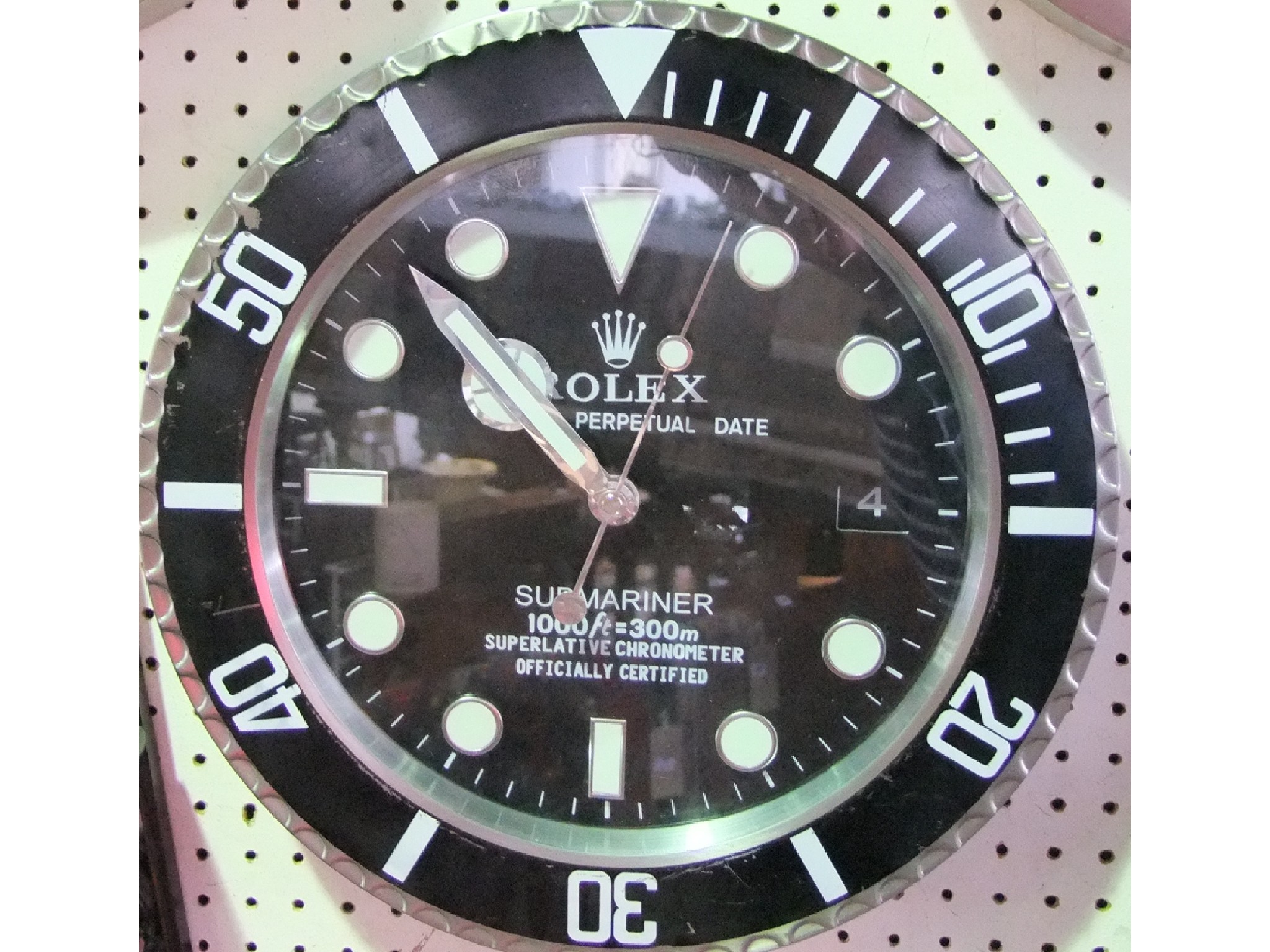 Appraisal: A Rolex wall clock the dial in the form of