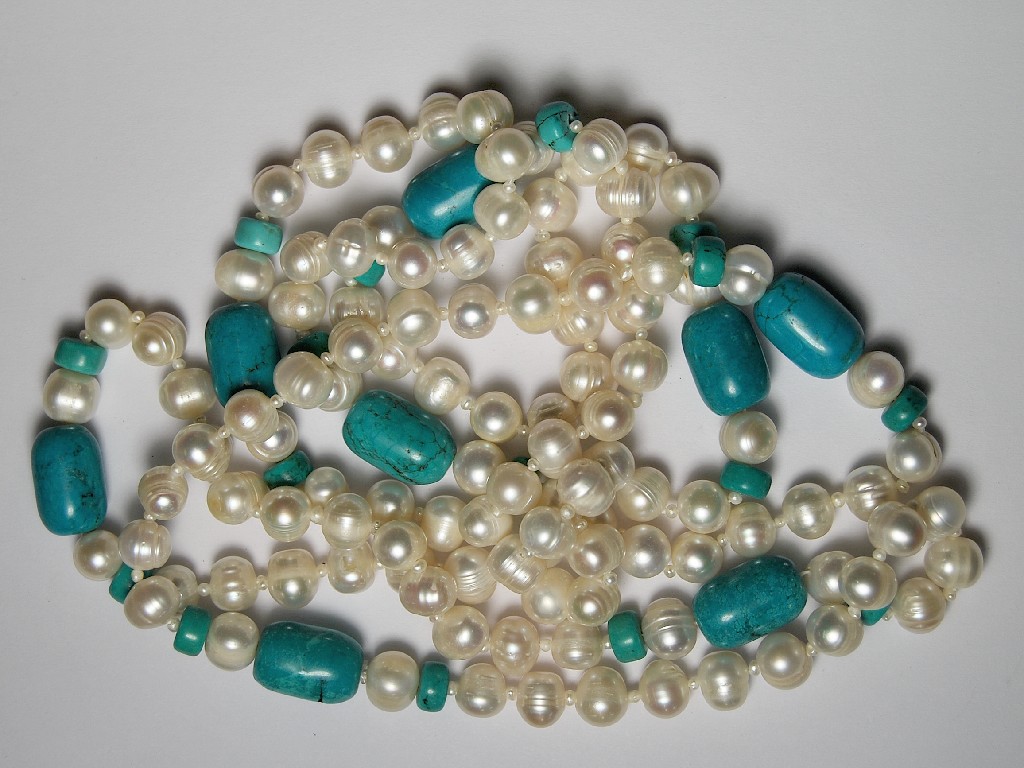 Appraisal: Single row of cultured pearl beads interspersed with turquoise-style beads