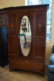 Appraisal: EDWARDIAN MAHOGANY AND MARQUETRY WARDROBE BORER