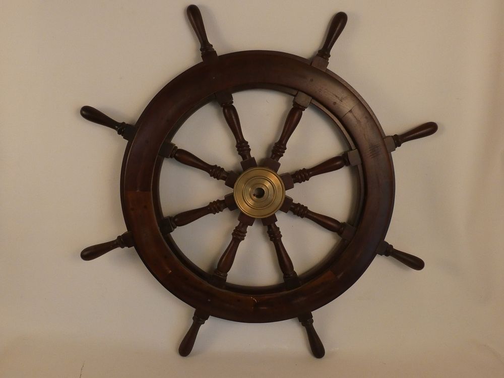 Appraisal: MAHOGANY SHIP'S WHEEL Fine heavy old mahogany or hardwood ship's