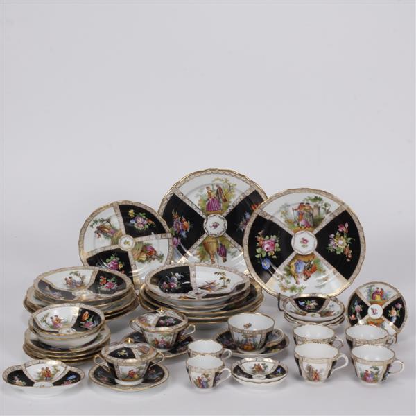 Appraisal: German hand-painted and gilt porcelain partial service mostly Richard Klemm