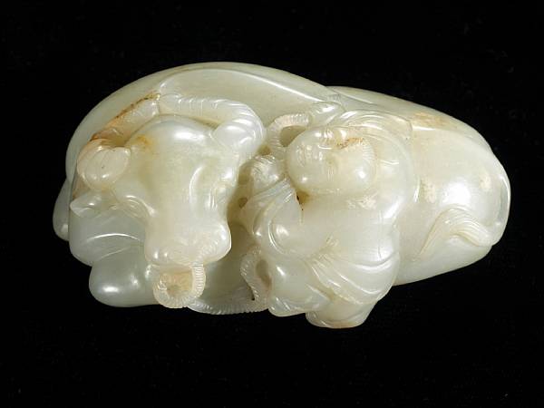 Appraisal: A small white jade figure of a recumbent water buffalo