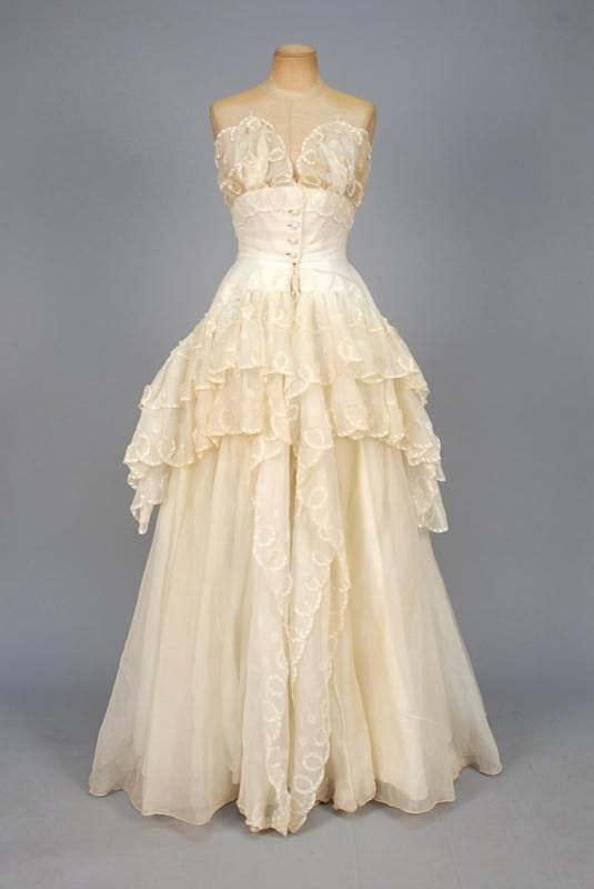 Appraisal: CHRISTIAN DIOR APPLIQUED ORGANDY BALLGOWN c Cream organdy over glazed