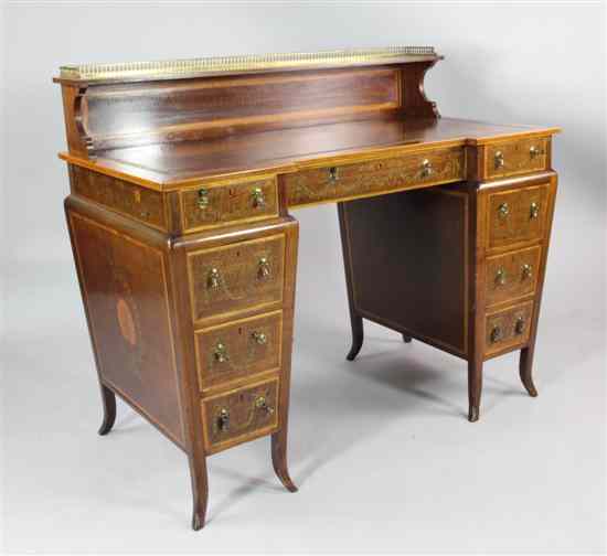 Appraisal: Edwards Roberts An Edwardian satinwood inlaid mahogany inverted breakfront desk