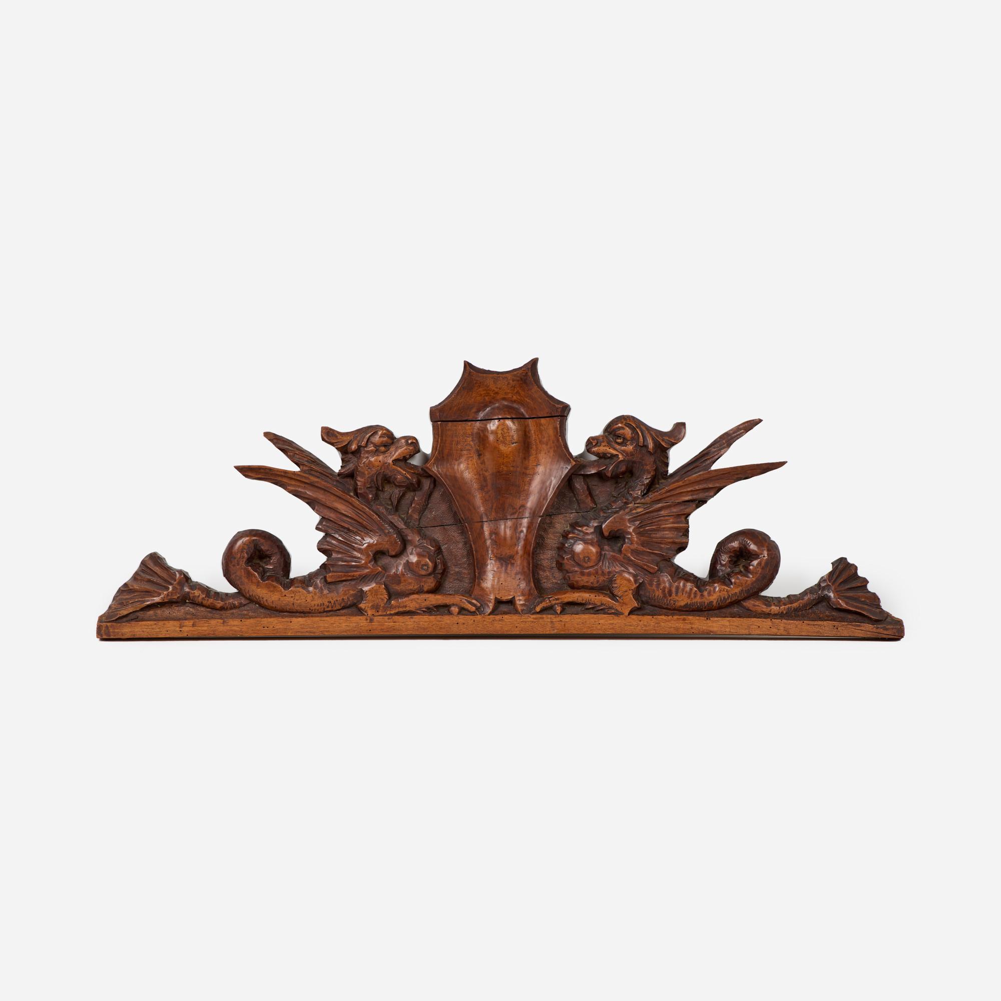 Appraisal: ANTIQUE BLACK FOREST WALNUT CARVING WITH CHIMERAS An antique Black