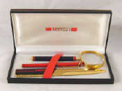 Appraisal: A boxed Ferrari Formula set of paperknife ballpoint and hand