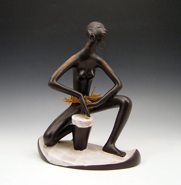 Appraisal: AUSTRIAN ANZENGRUBER KERAMIC FIGURE Semi nude African woman with drum