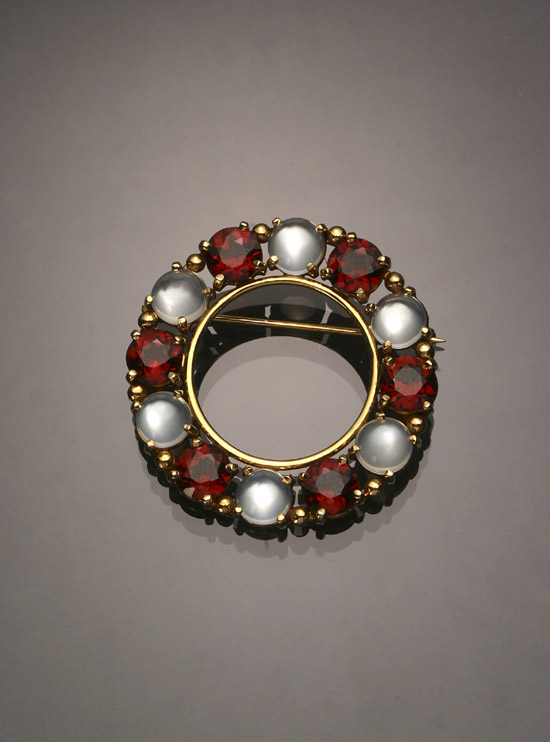 Appraisal: -Karat Yellow-Gold Garnet and Moonstone Circular Brooch Set with six