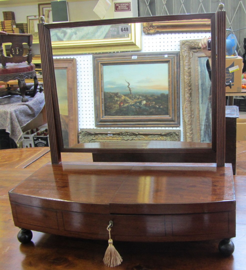 Appraisal: A th century and later mahogany toilet mirror the bow