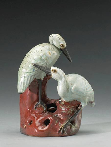 Appraisal: A flambe glazed stoneware figural double vase Depicting two cranes