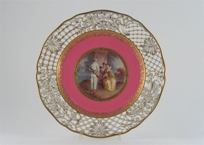 Appraisal: A Minton plate with a reticulated border of flowers and