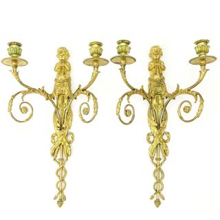 Appraisal: Pair of th Century French Gilt Bronze Figural Two Arm