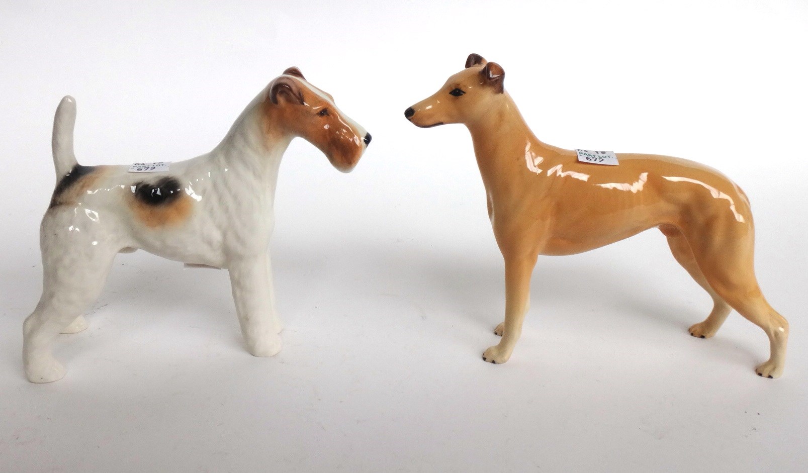 Appraisal: Five Beswick dogs an alsatian 'Champion Ulrica Brittas' a corgi